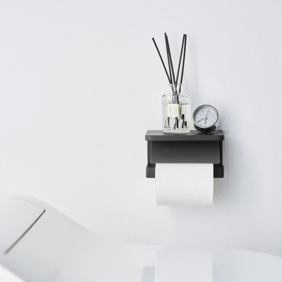 Veggmontert toalettpapirholder sort